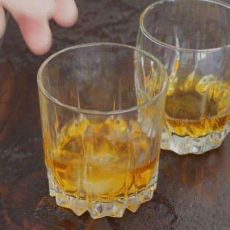 adding ice to whiskey video clip