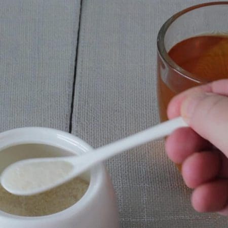 adding sugar to tea video clip