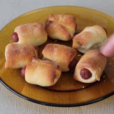 biting off of mini burger stock video clip