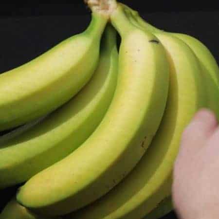 choosing banana from a bundle stock video clip